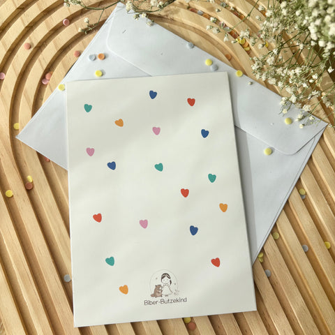 Carte d'anniversaire « Happy Birthday » colorée avec de nombreux cœurs
